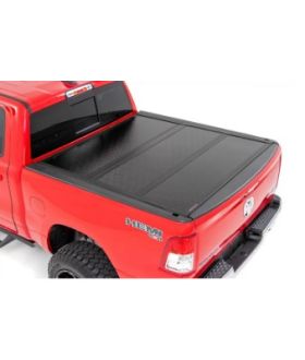 Rough Country 47320650 Dodge Low Profile Hard Tri-Fold Tonneau Cover (19-21 Ram 1500 Quad/Mega Cab | 6.5' Bed W/O Rambox)